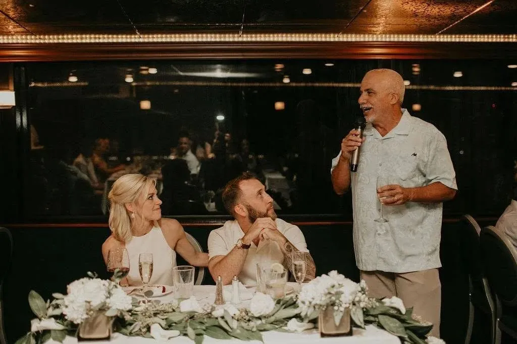 Mike Boza toasting Joseph and his wife Taylor